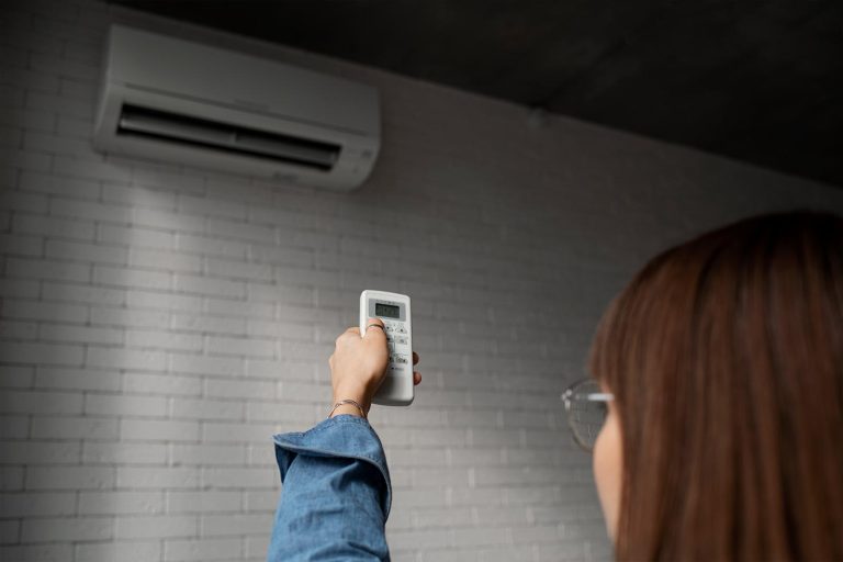 Woman enjoying her new ac unit, AC Installation Joplin